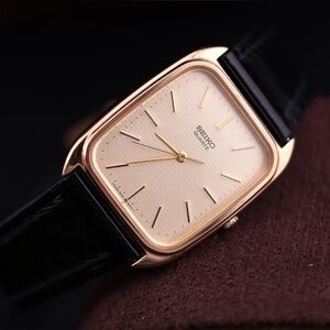 Vtg 1987 Seiko 9021-517H Watch
[Very Good Condition] Gold Waffle Pattern Dial